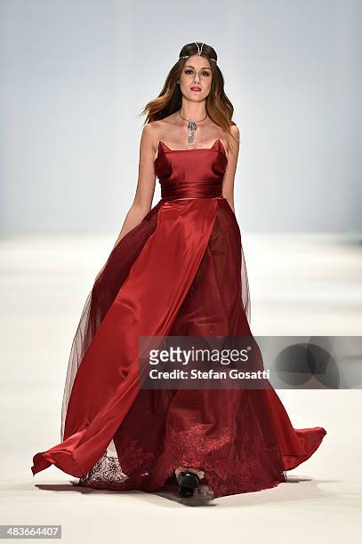Model walks the runway in a design by Dyspnea at the New Generation show during Mercedes-Benz Fashion Week Australia 2014 at Carriageworks on April...