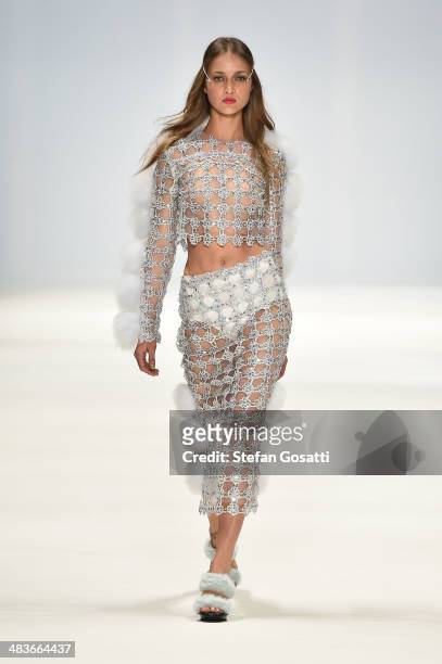 Model walks the runway in a design by Dyspnea at the New Generation show during Mercedes-Benz Fashion Week Australia 2014 at Carriageworks on April...