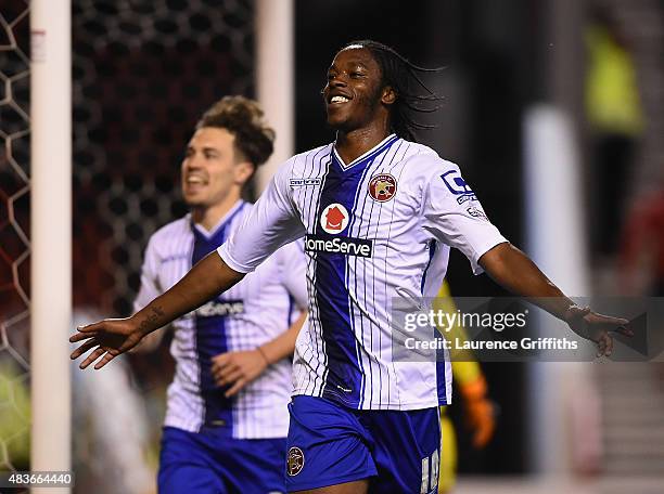 Romanine Sawyers of Walsall celebrates scoring the third goal during the Capital One Cup First Round match between Nottingham Forest and Walsall at...