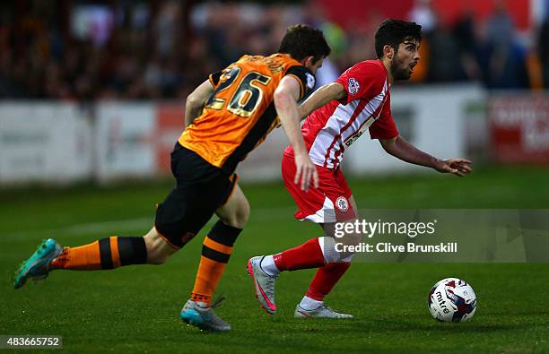 Piero Mingoia of Accrington Stanley in action with Andy Robertson of Hull City during the Capital One Cup First Round match between Accrington...