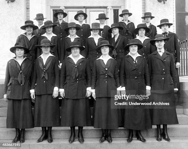 Women yeoman in front of the US Naval Hospital at Mare Island, Vallejo, California, 1918. Note the variety of ways their hats have been shaped, with...