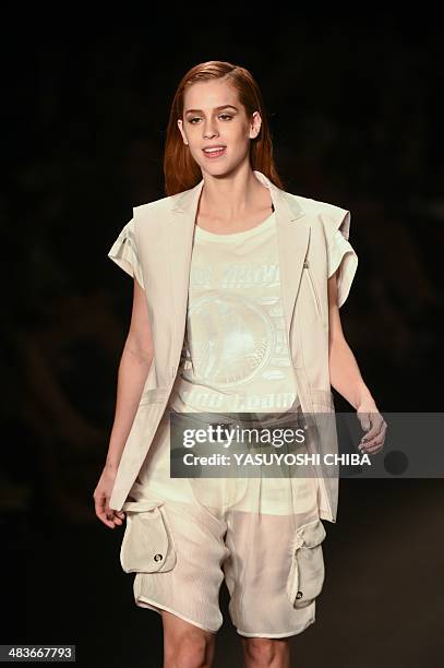 Brazilian actress Sophia Abrhao presents a creation by Coca-Cola jeans during the Fashion Rio 2015 Summer collection in Rio de Janeiro, Brazil, on...