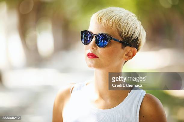 portrait of young woman in nature - short hair model stock pictures, royalty-free photos & images