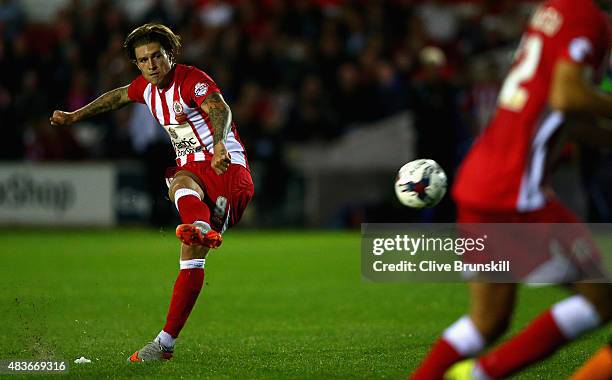 Josh Windass of Accrington Stanley takes a free kick during the Capital One Cup First Round match between Accrington Stanley and Hull City at Wham...