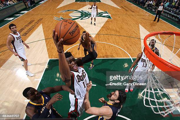 Jeff Adrien of the Milwaukee Bucks shoots against the Indiana Pacers on April 9, 2014 at the BMO Harris Bradley Center in Milwaukee, Wisconsin. NOTE...