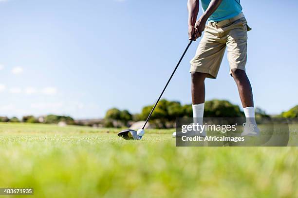 african golfer ready to drive the golf ball - langebaan stock pictures, royalty-free photos & images