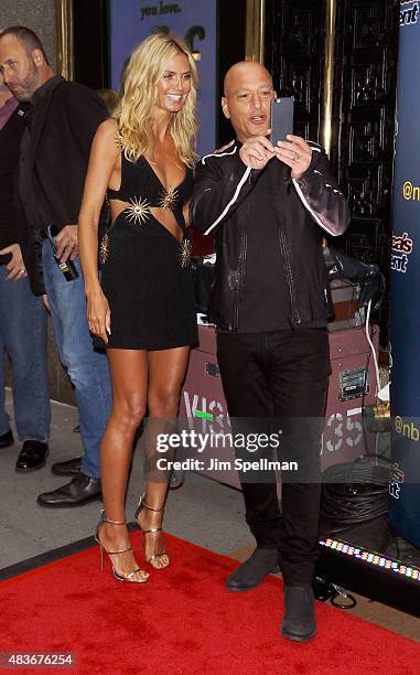 Model/TV personality Heidi Klum and comedian/TV personality Howie Mandel attend the "America's Got Talent" season 10 pre-show red carpet at Radio...