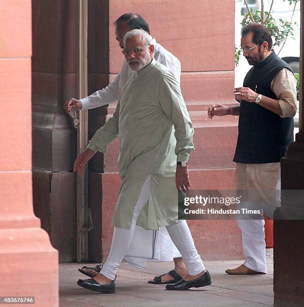 Prime Minister Narendra Modi with cabinet ministers after the BJP Parliamentary Party leaders meeting at Parliament House during the monsoon session...