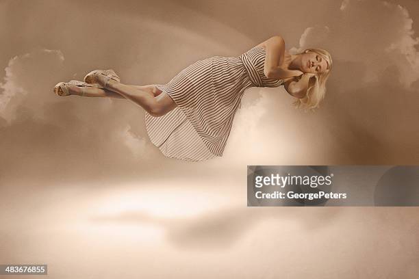 floating on a dream - zero gravity stock pictures, royalty-free photos & images
