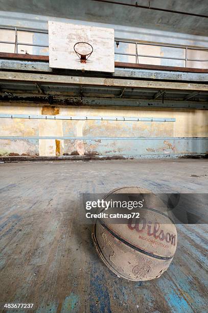 abandoned basketball court close up, grungy gymnasium interior - old basketball hoop stock pictures, royalty-free photos & images