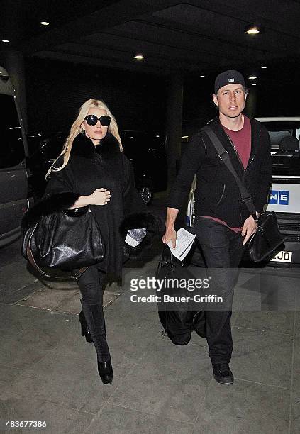 Jessica Simpson and Eric Johnson are seen arriving at St Pancras train station on March 07, 2010 in London, United Kingdom.