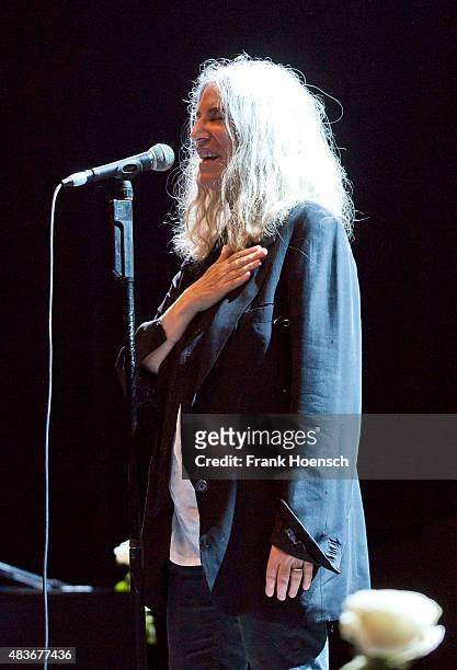 American singer Patti Smith performs live during a concert at the Tempodrom on August 11, 2015 in Berlin, Germany.