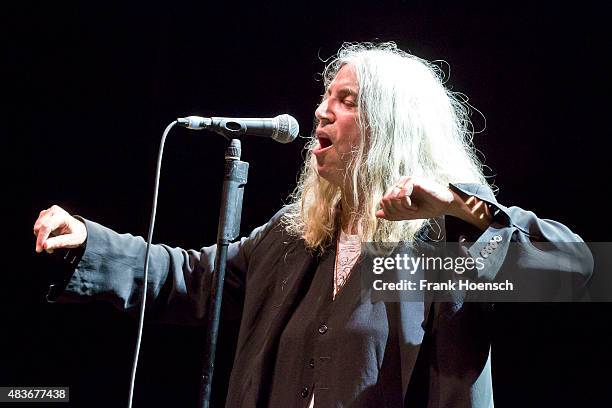 American singer Patti Smith performs live during a concert at the Tempodrom on August 11, 2015 in Berlin, Germany.