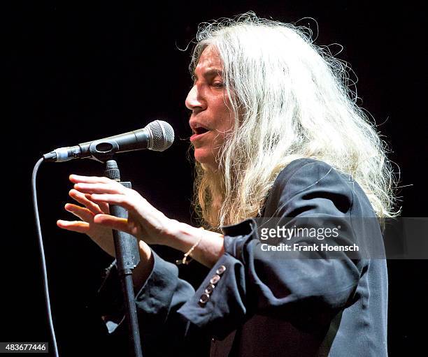 American singer Patti Smith performs live during a concert at the Tempodrom on August 11, 2015 in Berlin, Germany.