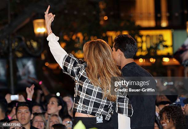 Jennifer Lopez and Mario Lopez are seen visiting 'Extra' at The Grove on March 03, 2011 in Los Angeles, California.