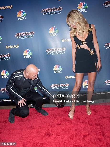 Comedian/TV personality Howie Mandel and Model/TV personality Heidi Klum attends the "America's Got Talent" pre-show red carpet arrivals at Radio...