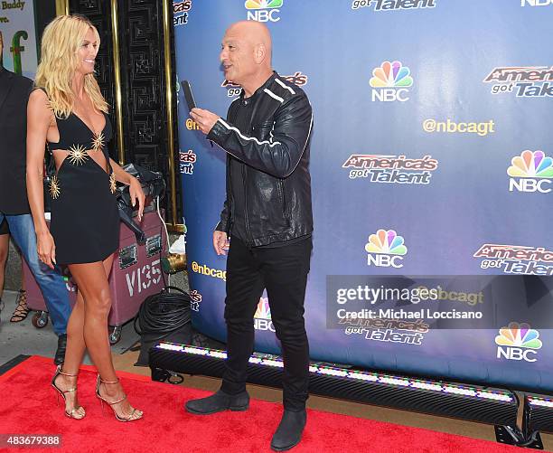Model/TV personality Heidi Klum and comedian/TV personality Howie Mandel take a picture before the "America's Got Talent" season 10 taping at Radio...