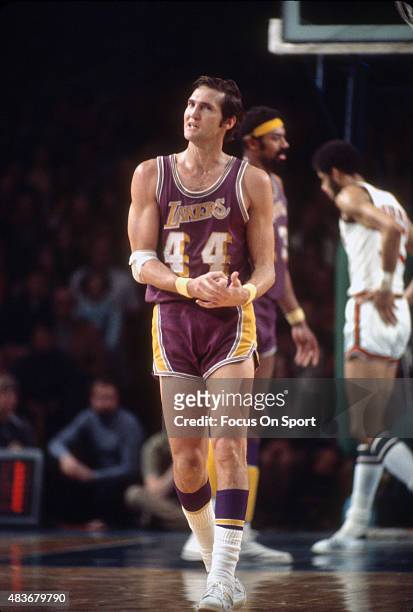 Jerry West of the Los Angeles Lakers looks on walking up court against the Milwaukee Bucks during an NBA basketball game circa 1972 at the Milwaukee...