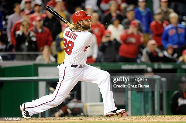 Jayson Werth of the Washington Nationals hits a grand slam in the eighth inning against the Miami Marlins at Nationals Park on April 9, 2014 in...