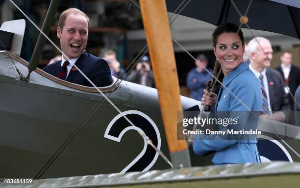 Catherine, Duchess of Cambridge and Prince William, Duke of Cambridge are seen looking at a Sopwith Pup at the "Knights of the Sky" exhibition at...