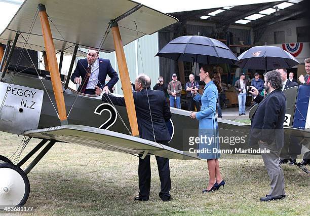 Catherine, Duchess of Cambridge and Prince William, Duke of Cambridge are seen looking at a Sopwith Pup at the "Knights of the Sky" exhibition at...