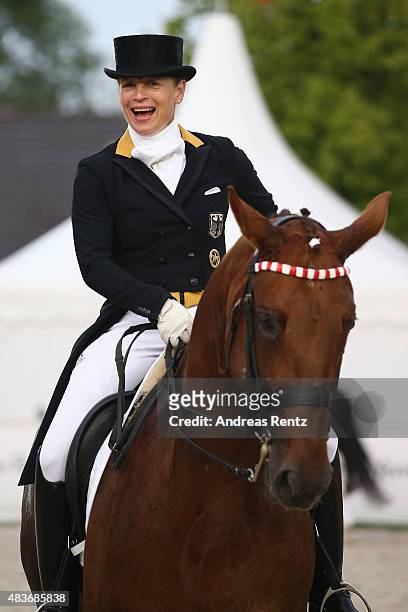 Isabell Werth takes part in the opening ceremony of the FEI European Championship 2015 media night on August 11, 2015 in Aachen, Germany.