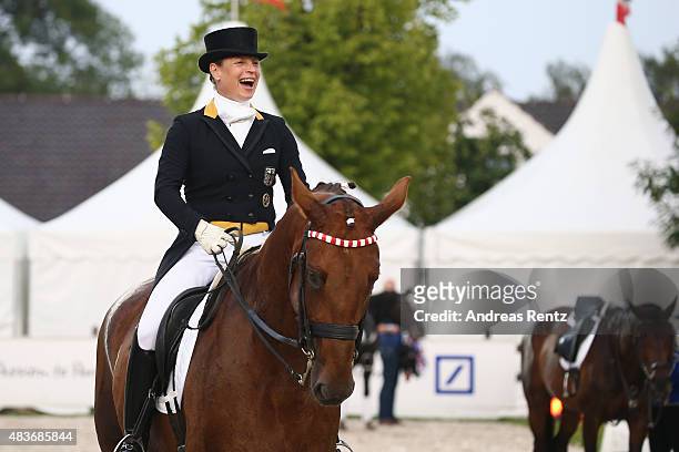 Isabell Werth takes part in the opening ceremony of the FEI European Championship 2015 media night on August 11, 2015 in Aachen, Germany.