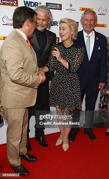 German Defense Minister Ursula von der Leyen and Armin Laschet attend the FEI European Championship 2015 media night on August 11, 2015 in Aachen,...