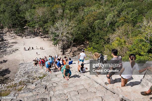 tourists at the mayan pyramid at coba -xxxl - coba stock pictures, royalty-free photos & images