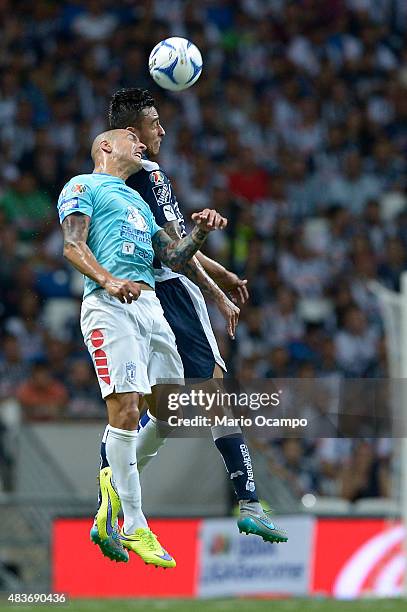 Jesus Zavala of Monterrey heads the ball with Ariel Nahuelpan of Pachuca during a 4th round match between Monterrey and Pachuca as part of the...