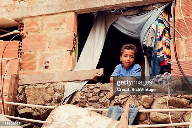 brazilian boy - brazil shanty towns and favelas stock pictures, royalty-free photos & images