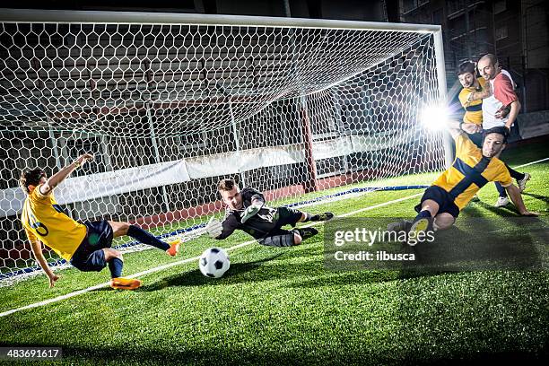 football match in stadium: striker's goal - bicycle kick stock pictures, royalty-free photos & images