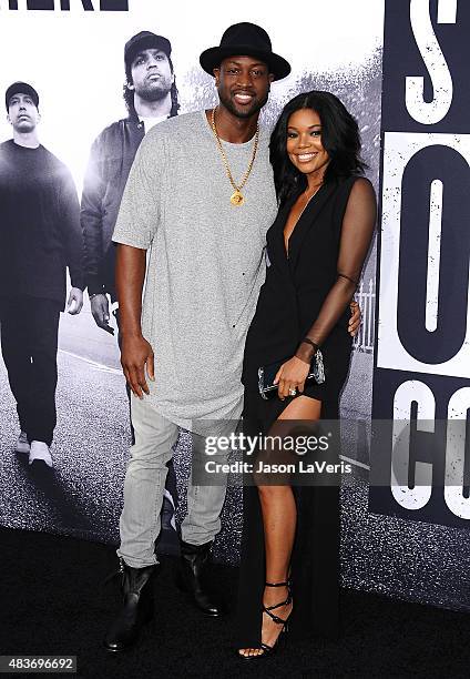 Dwyane Wade and Gabrielle Union attend the premiere of "Straight Outta Compton" at Microsoft Theater on August 10, 2015 in Los Angeles, California.