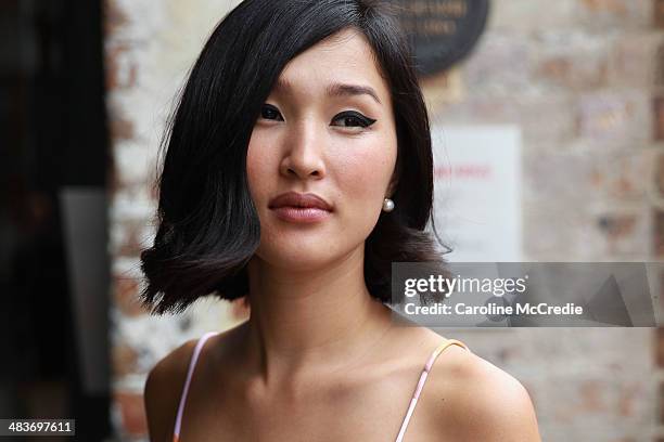 Nicole Warne wearing Alice Mccall top and skirt and Giovanni Rossi shoes at Mercedes-Benz Fashion Week Australia 2014 at Carriageworks on April 10,...