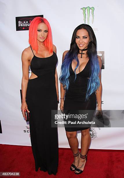 Singers of the Metal Band Butcher Babies Heidi Shepherd and Carla Harvey attend the premiere of "Alleluia! The Devil's Carnival" at the Egyptian...