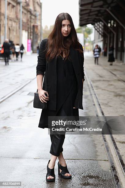 Nadia Bailey wearing Alexander Wang shoes, Vanessa Bruno pants, Claude Maus jacket, Willow dress and Dion Lee headpiece at Mercedes-Benz Fashion Week...
