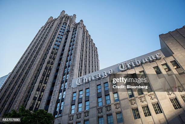 Chicago Tribune signage is displayed on the side of the Tribune Tower in Chicago, Illinois, U.S., on Friday, Aug. 7, 2015. Tribune Media Co. Is...