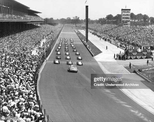 The parade lap before the start of the Indianapolis 500 auto race, Indianapolis, Indiana, 1961.