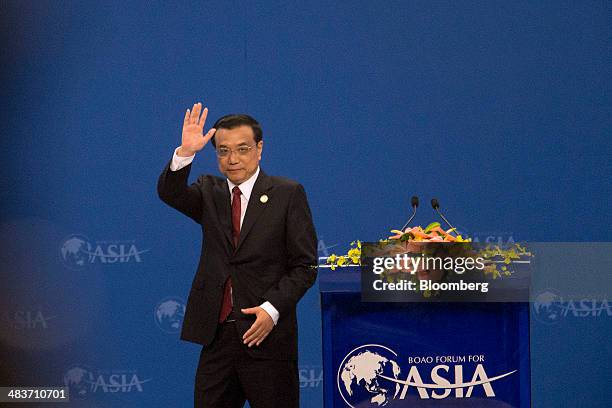 Li Keqiang, China's premier, waves after delivering a speech at the Boao Forum for Asia in Boao, Hainan, China, on Thursday, April 10, 2014. Li said...