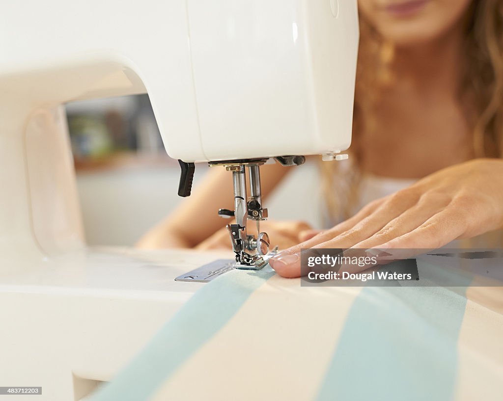 Woman Using Sewing Machine Close Up High-Res Stock Photo - Getty Images