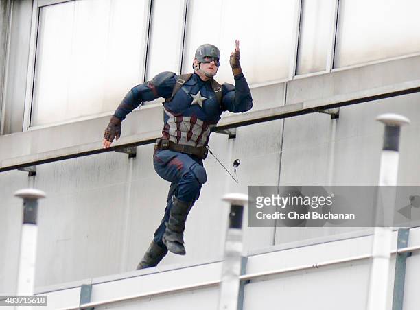 Stuntman dressed as Captain America is seen during filming on the set of Captain America, Civil War on August 12, 2015 in Berlin, Germany.
