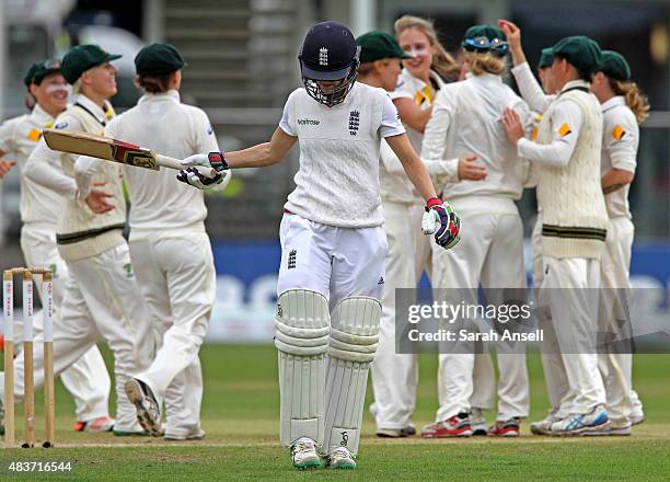 England's Lydia Greenway swings her bat in frustration after being dismissed by Ellyse Perry as Australia celebrate during day two of the Kia Women's...