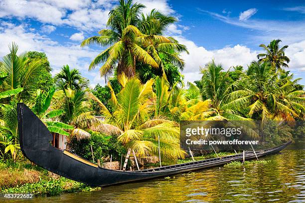 traditional snake boat on the kerala backwaters in india - beauty in nature stock pictures, royalty-free photos & images