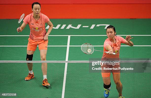 Tian Qing and Zhao Yunlei of China compete against Jongkonphan Kittiharakul and Rawinda Prajongjai of Thailand in the 2015 Total BWF World...