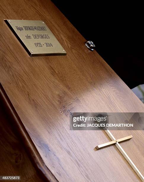 Picture taken on April 10, 2014 in Paris shows the coffin of French author Regine Desforges during her funeral. Regine Desforges, an author, editor,...