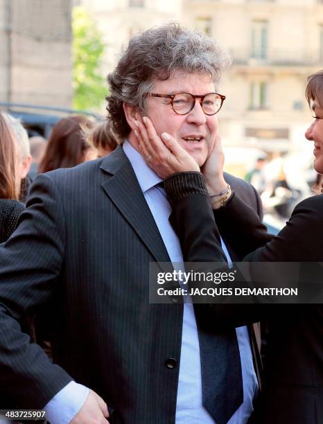 Franck Spengler, son of French author Regine Deforges, arrives to attend his mother's funeral on April 10, 2014 in Paris. Regine Deforges, an author,...