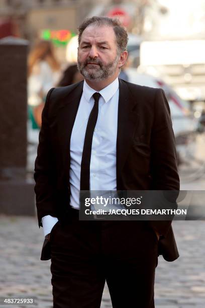 Head of Lagardere group media department Denis Olivennes arrives to attend French author Regine Deforges's funeral on April 10, 2014 in Paris. Regine...