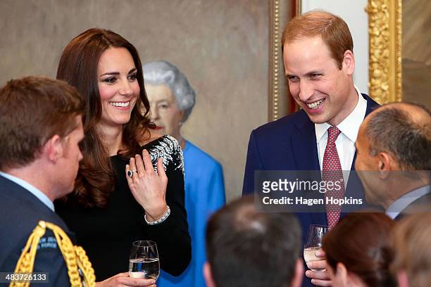 Prince William, Duke of Cambridge and Catherine, Duchess of Cambridge mingle during a state reception at Government House on April 10, 2014 in...