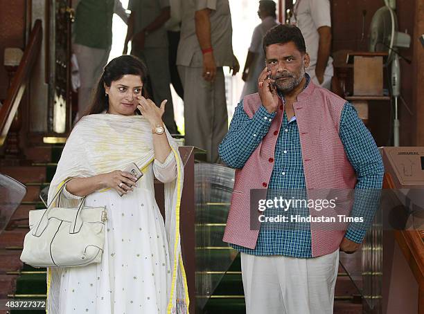 Poonamben Madam and Pappu Yadav during the monsoon session at Parliament House, on August 12, 2015 in New Delhi, India. A blast from the past and...