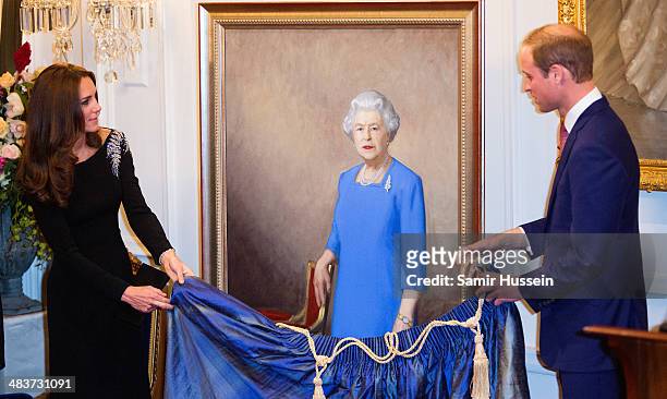 Catherine, Duchess of Cambridge and Prince William, Duke of Cambridge unveil a portrait of Queen Elizabeth II, painted by New Zealand artist Nick...